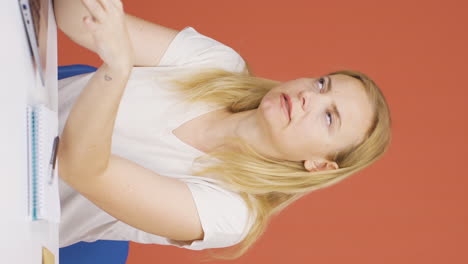 Vertical-video-of-The-woman-who-fell-asleep-in-front-of-a-laptop.